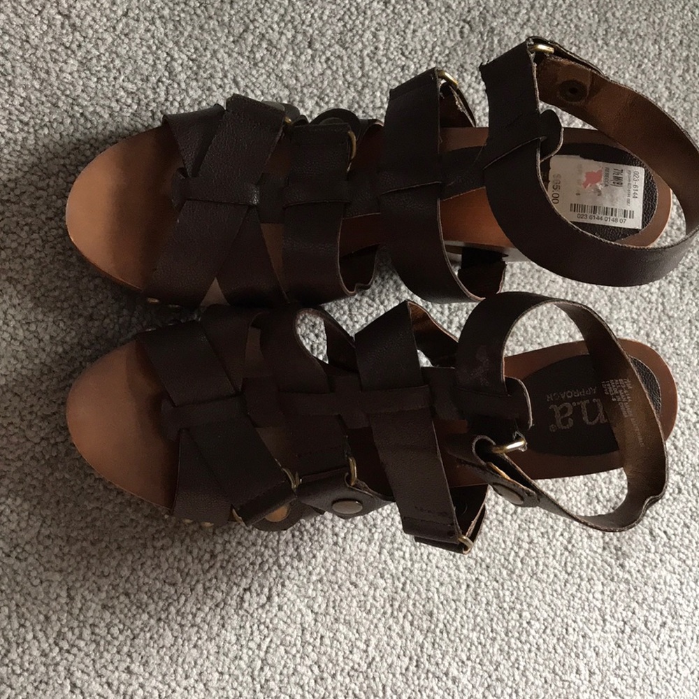 Higgs heels , never worn a.n.a brand size 7.5